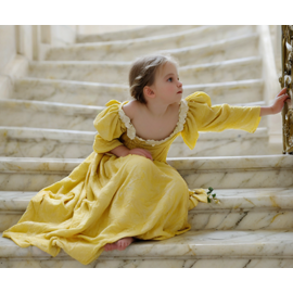 child in yellow gown